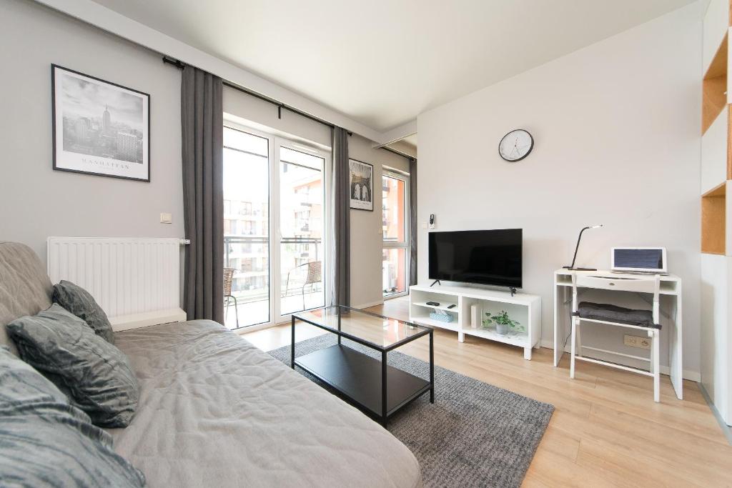 Televízia a/alebo spoločenská miestnosť v ubytovaní Main Trainstation one bedroom AC p4you pl