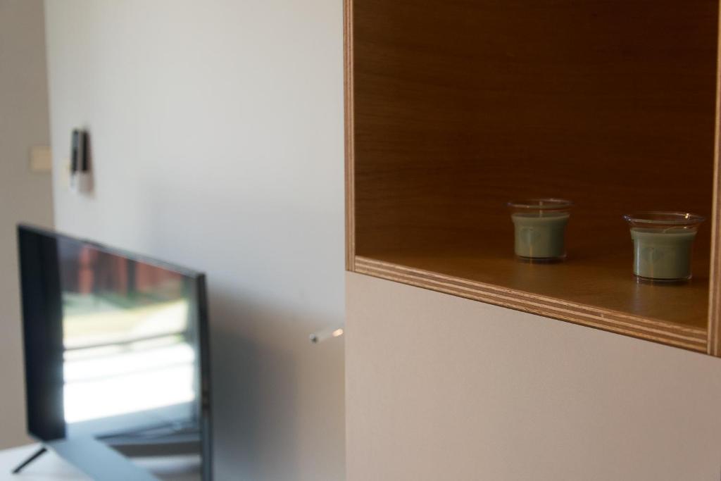 Televízia a/alebo spoločenská miestnosť v ubytovaní Main Trainstation one bedroom AC p4you pl