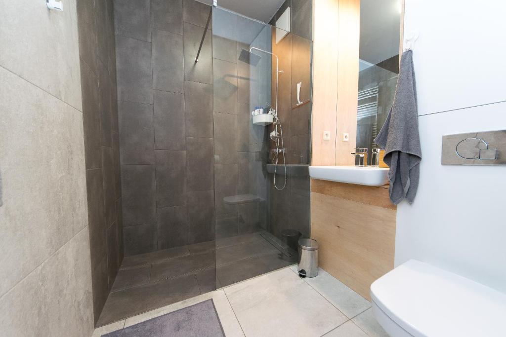 Kúpeľňa v ubytovaní Main Trainstation one bedroom AC p4you pl