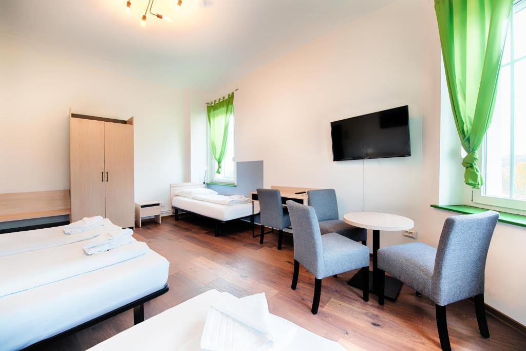 Postel nebo postele na pokoji v ubytování Hotel B1