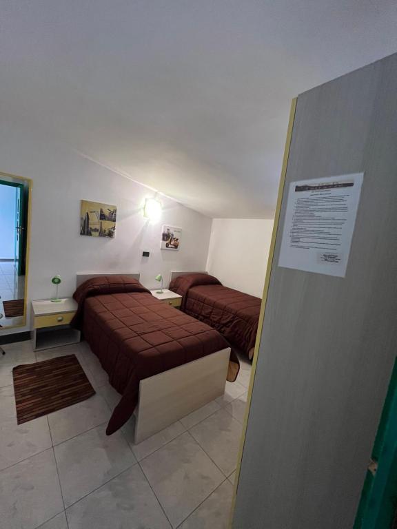 Ένα ή περισσότερα κρεβάτια σε δωμάτιο στο B&B Le Terrazze