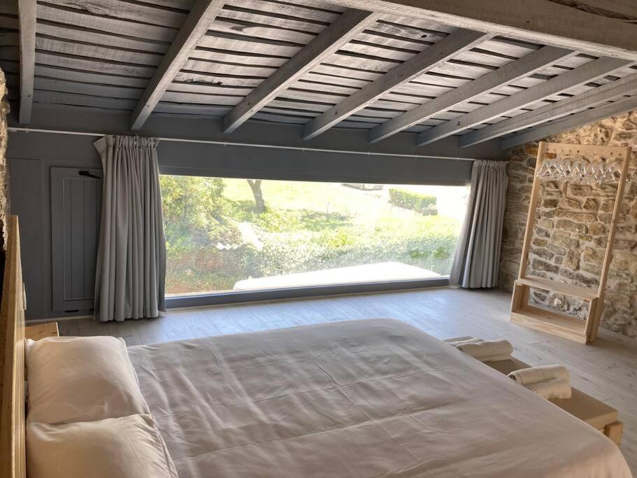 Ένα ή περισσότερα κρεβάτια σε δωμάτιο στο Casa para 8, Santillana y playas