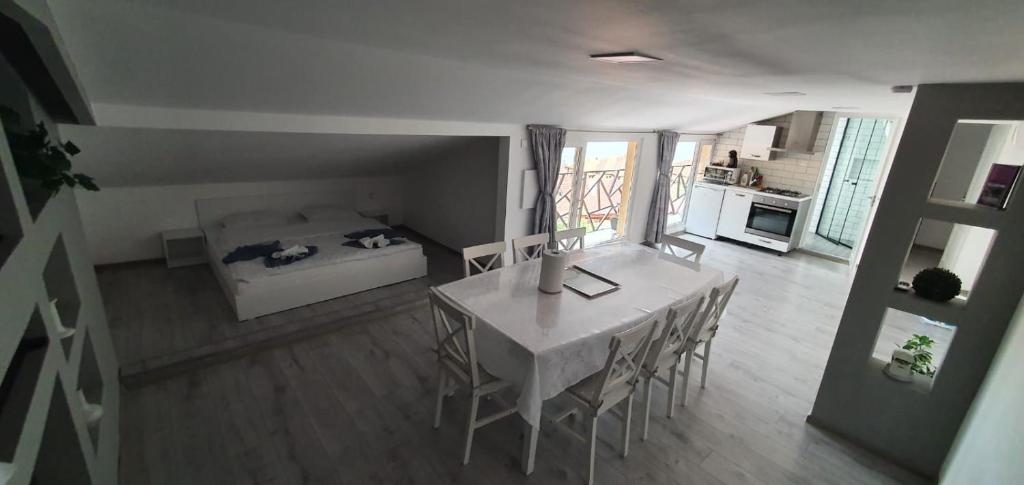Kuchyň nebo kuchyňský kout v ubytování Apartament La Sika