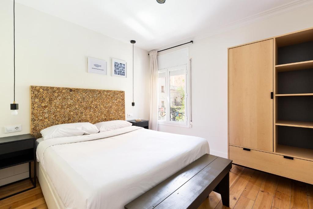 Posteľ alebo postele v izbe v ubytovaní WOW Apartments by Olala Homes
