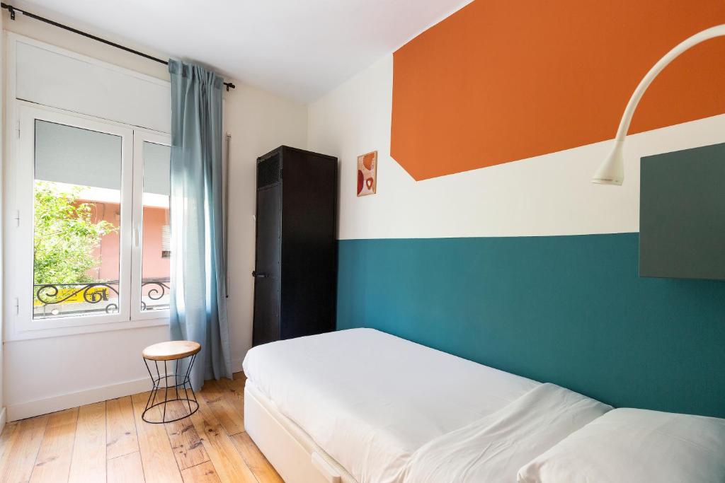 Posteľ alebo postele v izbe v ubytovaní WOW Apartments by Olala Homes