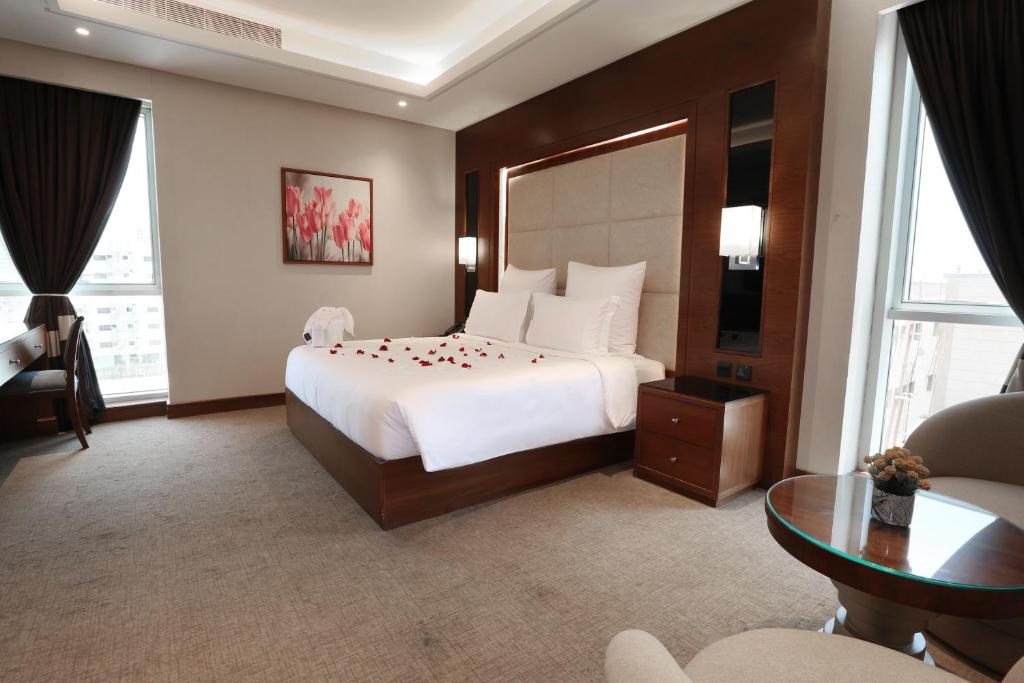 Voodi või voodid majutusasutuse Weekend Hotel Sari toas