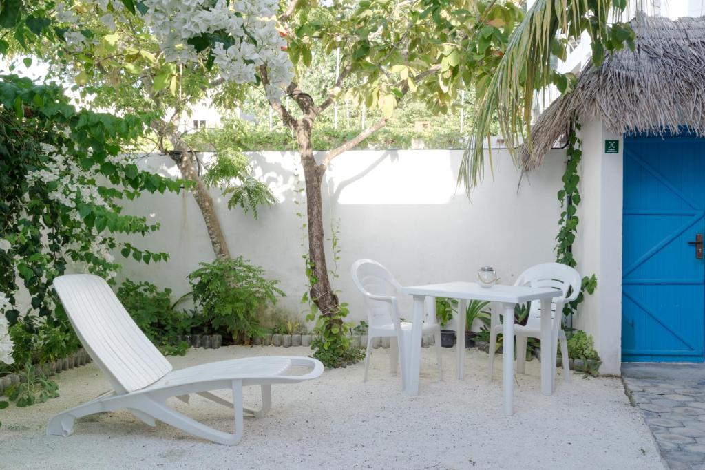 Zahrada ubytování Palm Gate Maldives