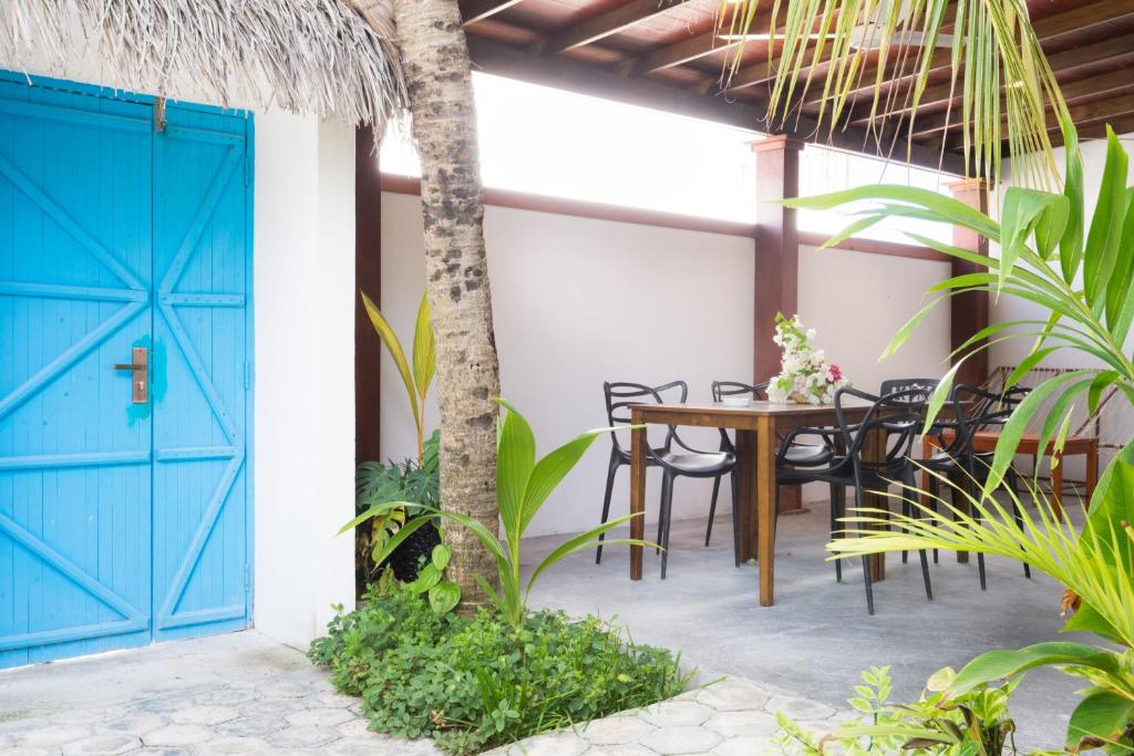 Patio nebo venkovní prostory v ubytování Palm Gate Maldives