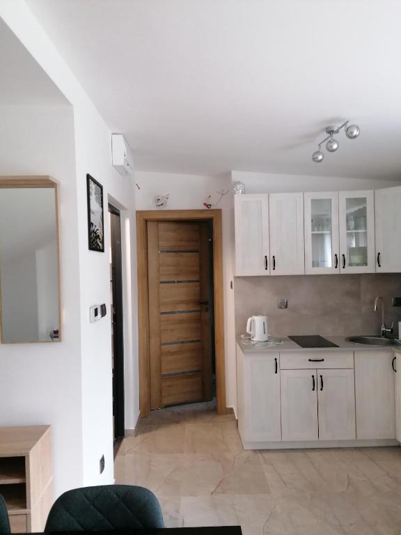 Kuchyň nebo kuchyňský kout v ubytování Apartamenty Wisła Lipowa 16-4D