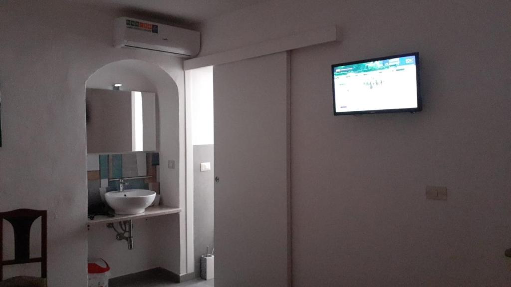 TV a/nebo společenská místnost v ubytování Zurigo Val di Noto