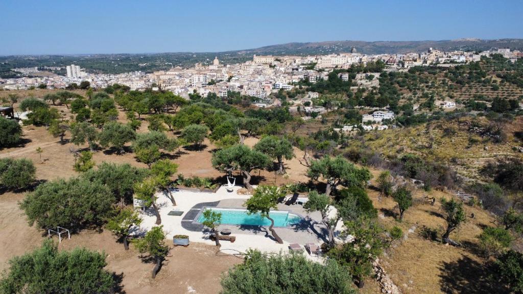 an aerial view of a resort with a swimming pool at Villa Il Carrubo val di noto con piscina privata in Avola
