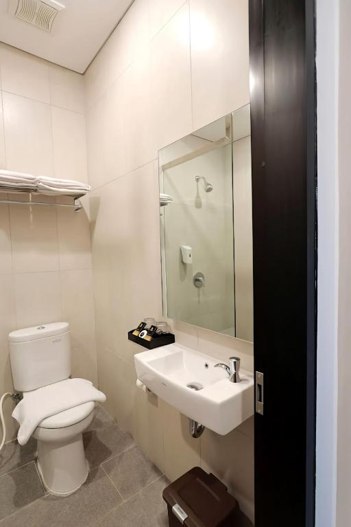 Koupelna v ubytování Hayo Hotel Palembang