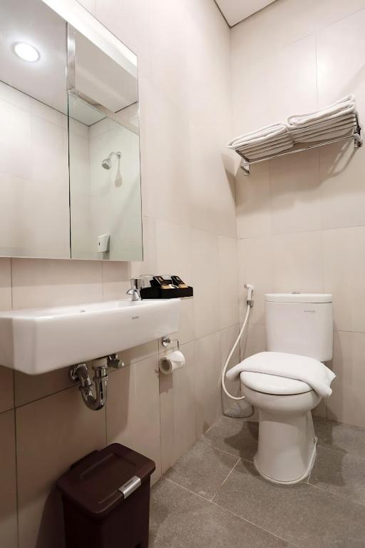 Koupelna v ubytování Hayo Hotel Palembang