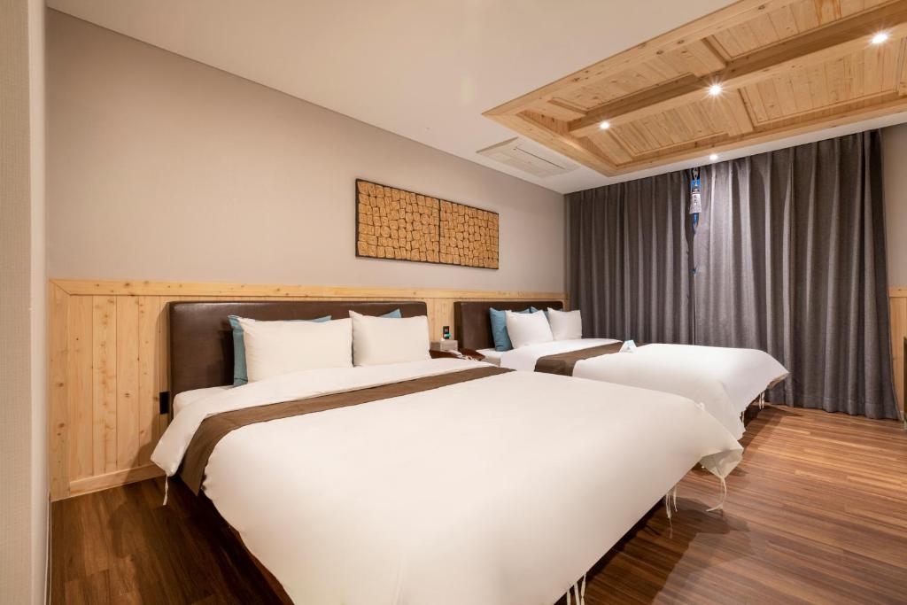 Postel nebo postele na pokoji v ubytování Sorgente Business Hotel