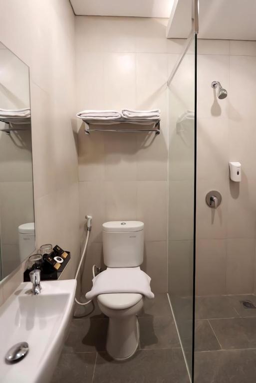 Koupelna v ubytování Hayo Hotel Palembang