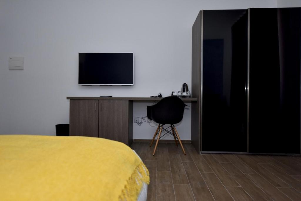 Sjónvarps- og/eða afþreyingartæki á Quaint Boutique Hotel Nadur