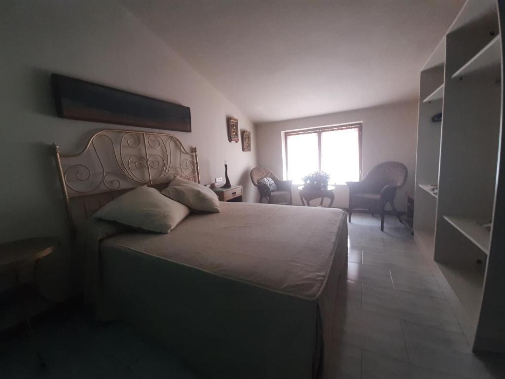 Postel nebo postele na pokoji v ubytování Villa Isabel 2 Llaves