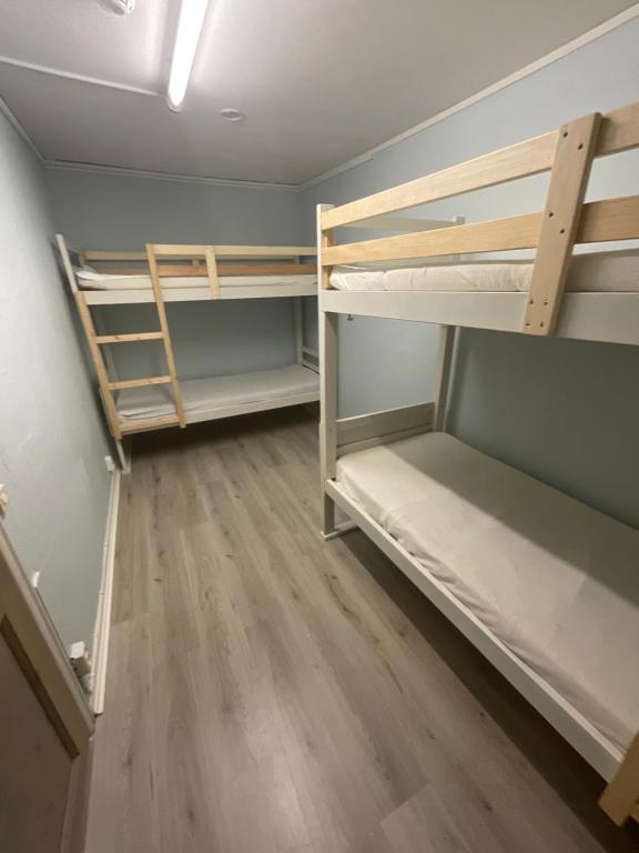 Postel nebo postele na pokoji v ubytování Aspan Kurs & Lägergård