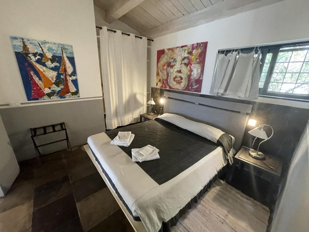 Posteľ alebo postele v izbe v ubytovaní Villa La Cava del Val di Noto con piscina privata