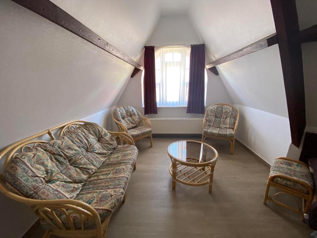 Posezení v ubytování Vakantiecentrum Zeelinde