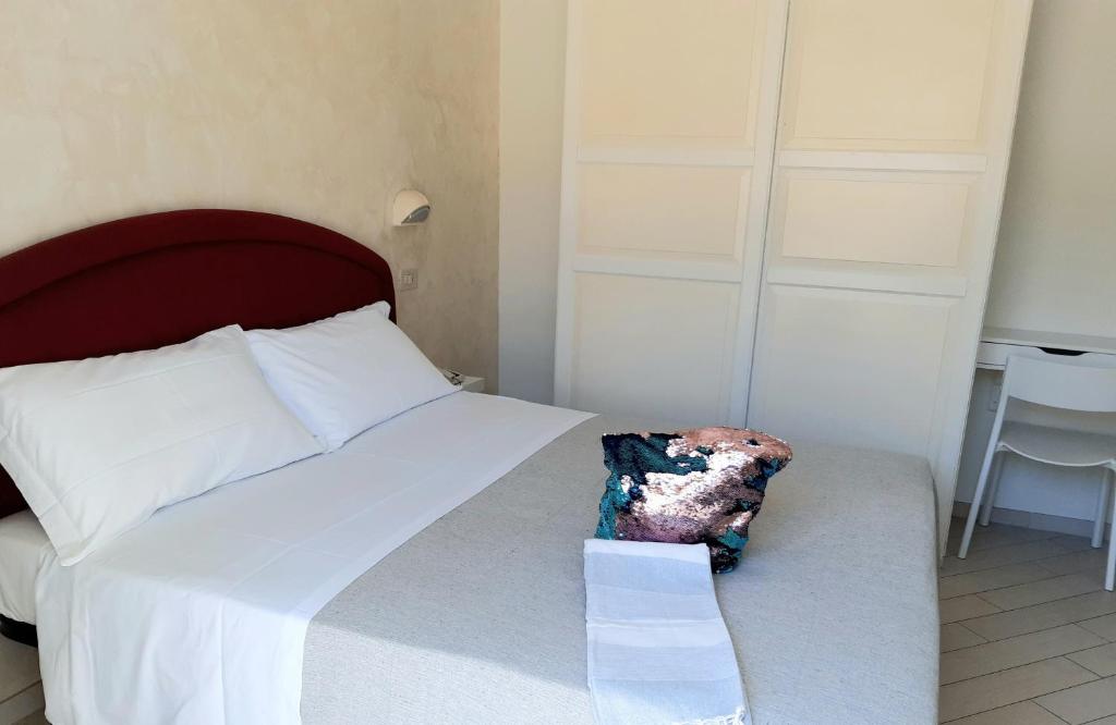 Postel nebo postele na pokoji v ubytování Hotel Raul