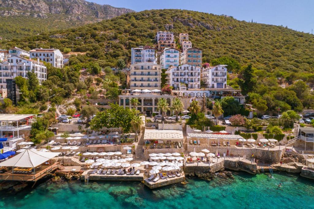 an aerial view of a resort on a mountain at Hera Hotel in Kaş