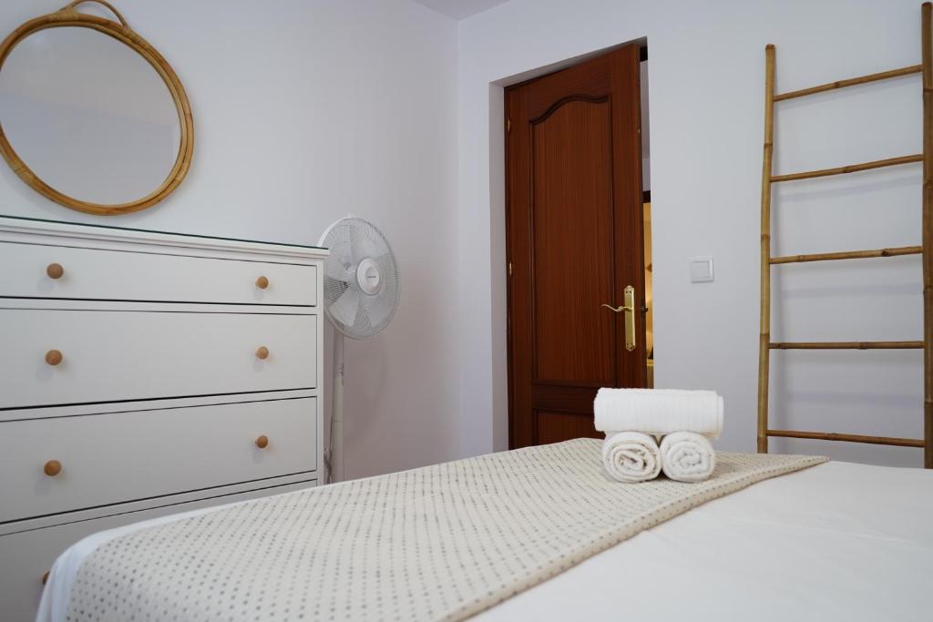 Posteľ alebo postele v izbe v ubytovaní Apartamento La Barca