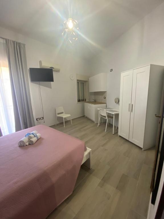 Postel nebo postele na pokoji v ubytování Home Demetra