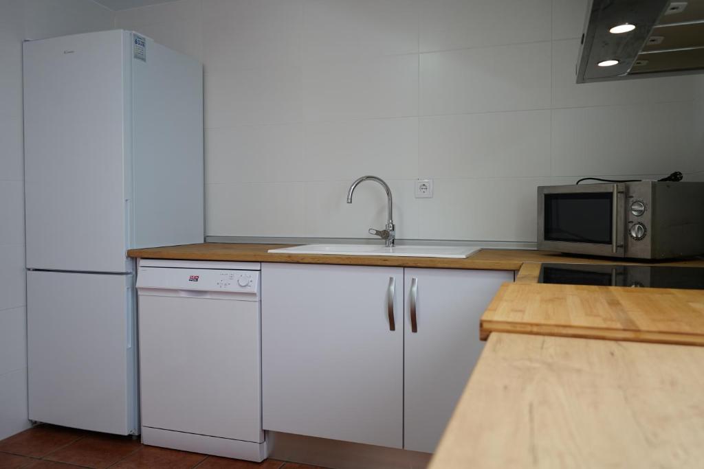 Kuchyňa alebo kuchynka v ubytovaní Apartamento La Barca