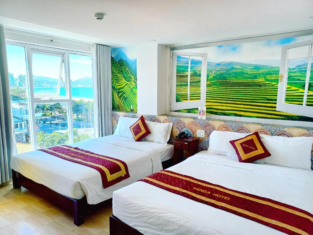 Postel nebo postele na pokoji v ubytování VANDA Hotel Nha Trang