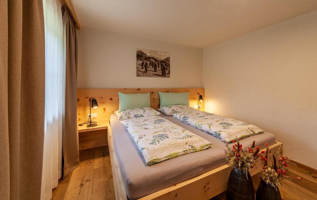 Łóżko lub łóżka w pokoju w obiekcie Schildhof Ebion Familienwohnung