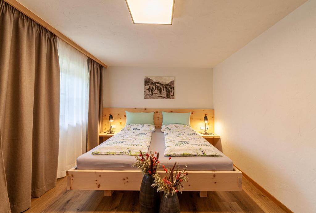 Łóżko lub łóżka w pokoju w obiekcie Schildhof Ebion Familienwohnung