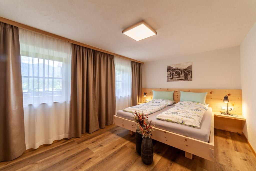 Łóżko lub łóżka w pokoju w obiekcie Schildhof Ebion Familienwohnung