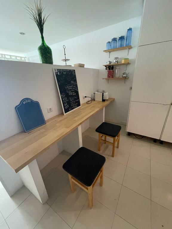 Kuchyň nebo kuchyňský kout v ubytování São João Beach Lounge