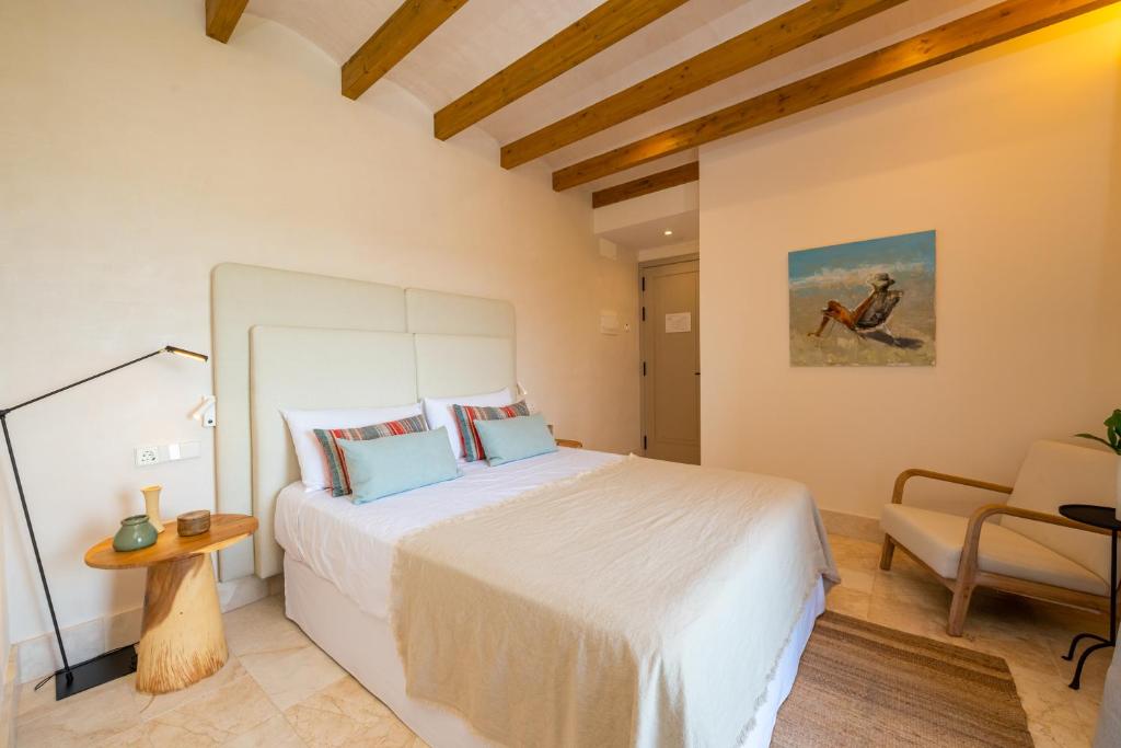 Postel nebo postele na pokoji v ubytování Casa Aura Hotel