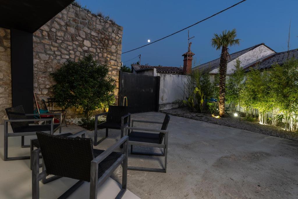 Patio alebo iná vonkajšia časť ubytovania Villa Arija