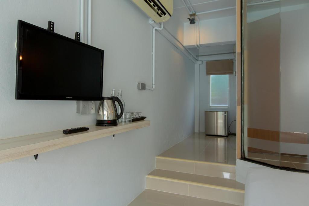Kuchyň nebo kuchyňský kout v ubytování The Nest Resort Patong