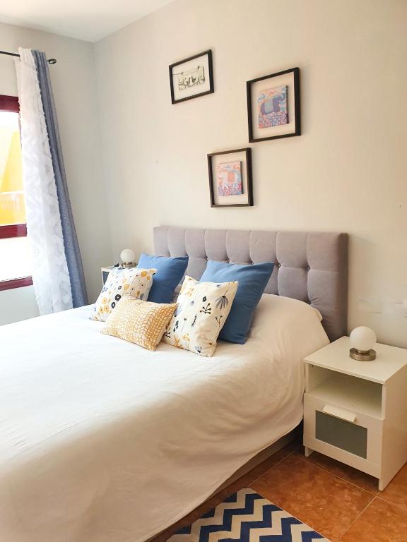 Postel nebo postele na pokoji v ubytování Allamanda Home