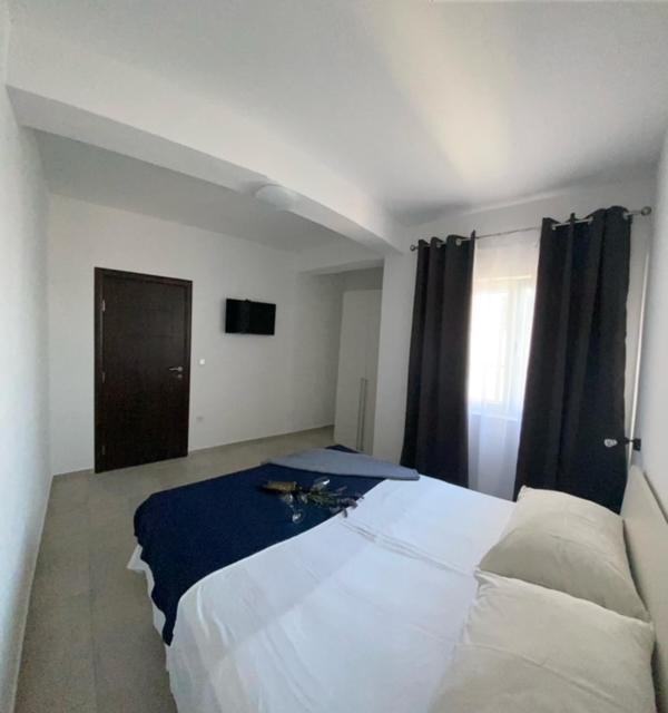 Postel nebo postele na pokoji v ubytování Apartments Marina