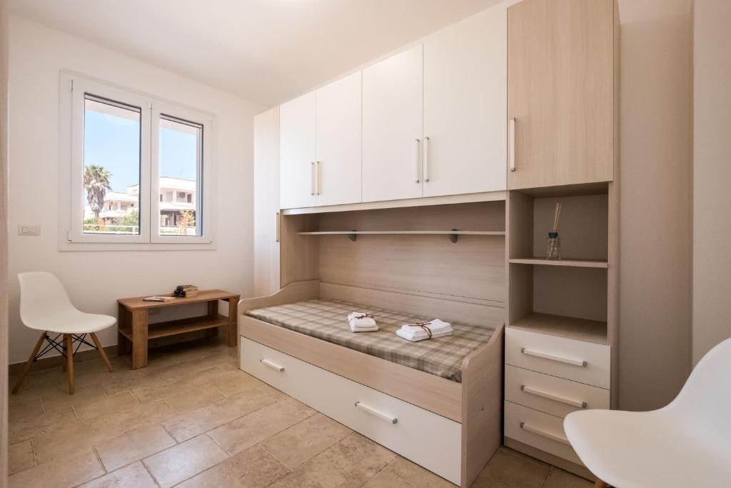 Postel nebo postele na pokoji v ubytování Villa Bianca
