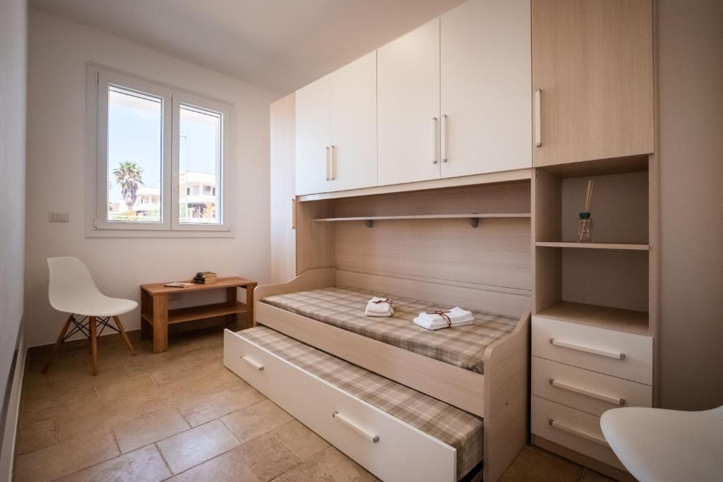 Postel nebo postele na pokoji v ubytování Villa Bianca