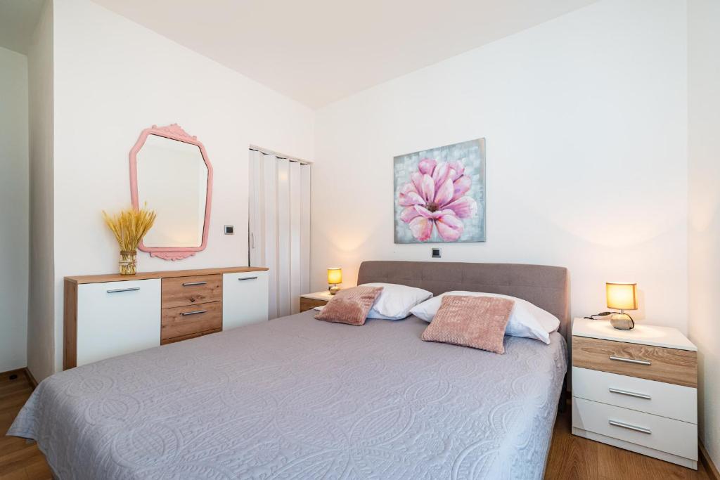Posteľ alebo postele v izbe v ubytovaní Apartman MISS Pridraga
