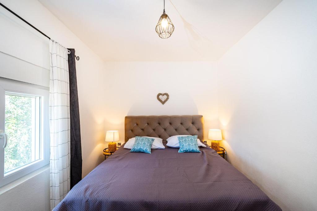 Posteľ alebo postele v izbe v ubytovaní Apartman MISS Pridraga