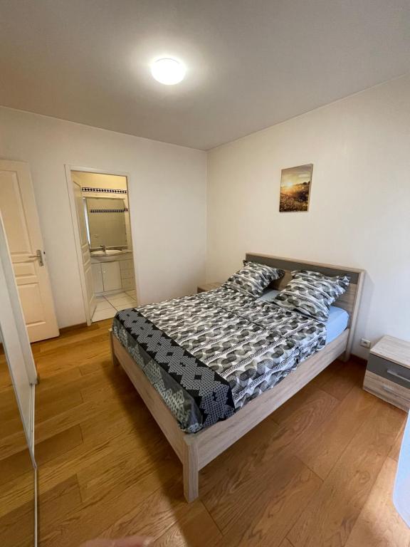 Posteľ alebo postele v izbe v ubytovaní Grand appartement 87m2 à 10 mètres de la plage