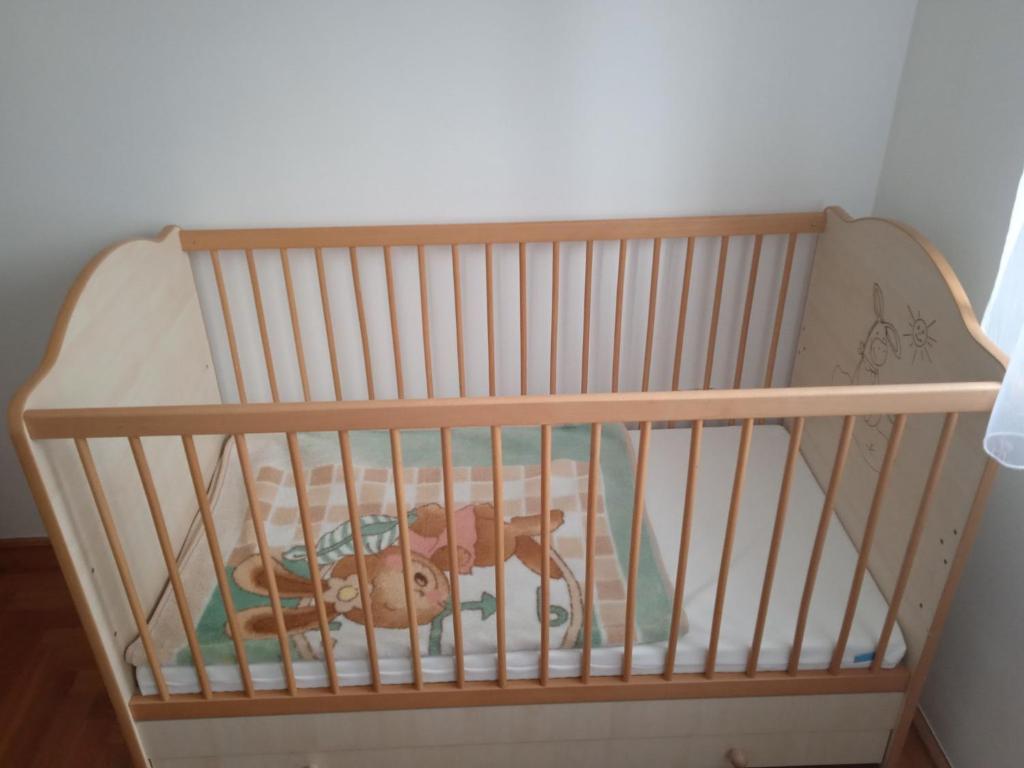 Łóżko lub łóżka w pokoju w obiekcie Family apartment-családias hangulat