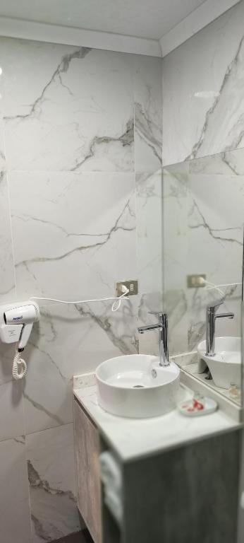 Koupelna v ubytování Hotel Real