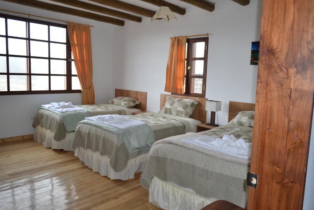 Postel nebo postele na pokoji v ubytování Hotel PrincesaToa