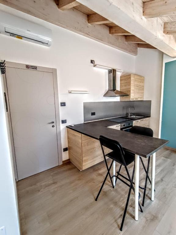 Kuchyň nebo kuchyňský kout v ubytování Il B&B di PIAZZA MOTTA