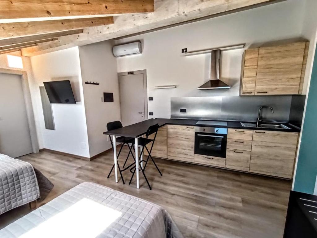Kuchyň nebo kuchyňský kout v ubytování Il B&B di PIAZZA MOTTA