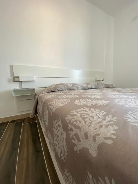 Postel nebo postele na pokoji v ubytování Manfredi Sea Room